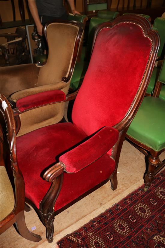 Upholstered mahogany elbow chair(-)